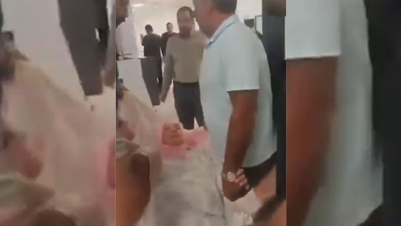Ambulans talebi reddedilince eşini battaniyeye sarıp hastaneye taşıdı