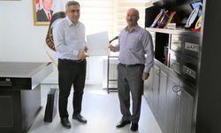 Ergani Belediye Başkanı Arif Mete’ye emeklilik belgesi verdi