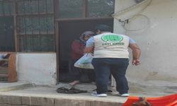 Umut Kervanı, Kozan’da muhtaç ailelere gıda yardımı yaptı