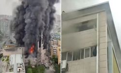 Çin'de alevlere teslim olan binanın çatısında mahsur kalanlar hastaneye kaldırıldı