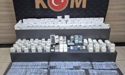 Kocaeli'de kaçakçılık operasyonunda çok sayıda ürün ve sahte para ele geçirildi