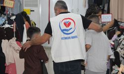 Yetimler Vakfı Kurban Bayramı öncesi Cizre'de onlarca yetimi giydirdi