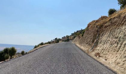 Çermik'in kırsal mahallelerinde yapımı devam eden yolun 8 kilometresi hizmete açıldı