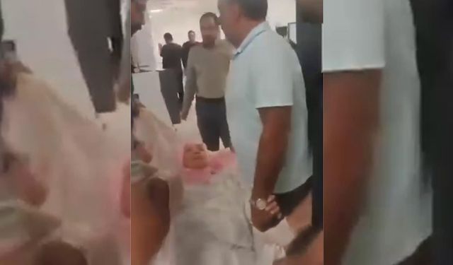 Ambulans talebi reddedilince eşini battaniyeye sarıp hastaneye taşıdı
