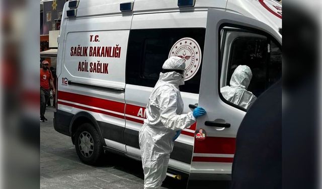 Karşıyaka çarşısında koruyucu kıyafetli sağlık ekipleri dikkat çekti