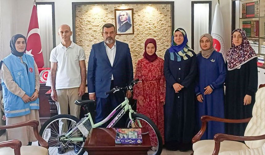 12 yaşındaki hafıza bisiklet hediyesi